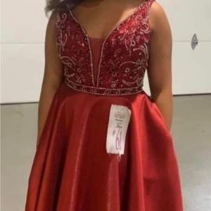 Pageant or prom gown. Adult small red